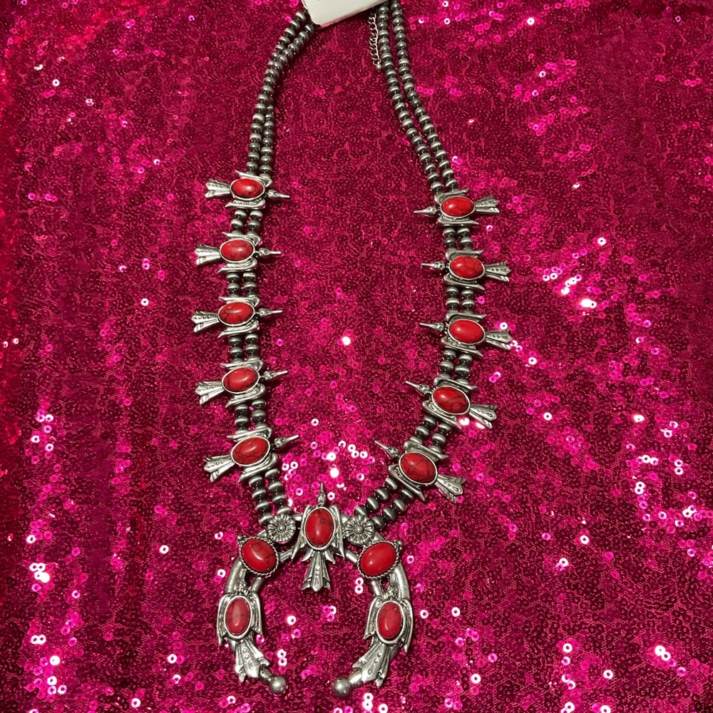 Elegant Silver Necklace with Red Embellishments